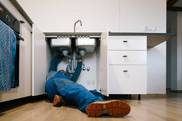 Professional Drain Cleaning technician working in Hugo, OK